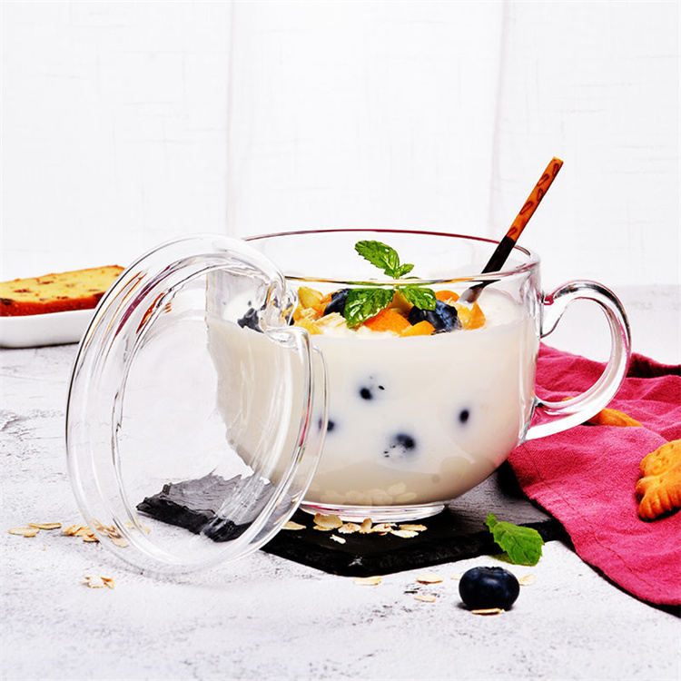 Glass breakfast cup with lid spoon and oatmeal bowl