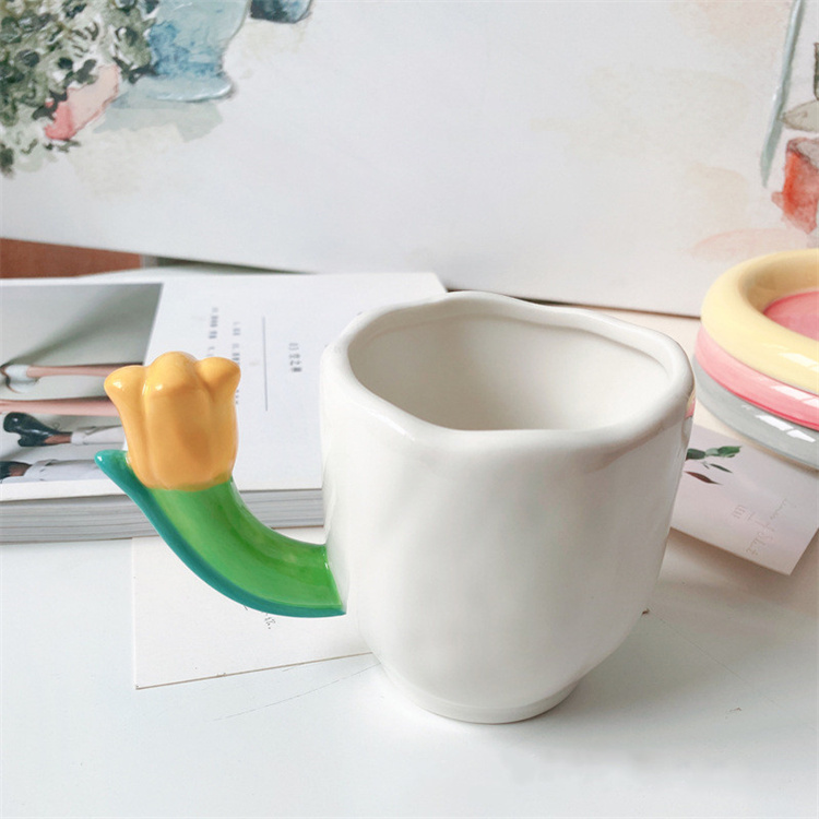 Ceramic water cup with irregular tulip handle