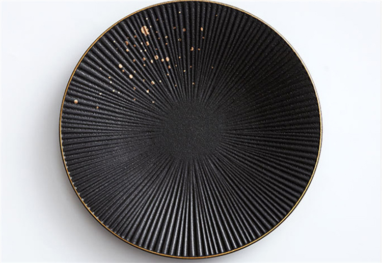 Gold plated frosted black ceramic western dish