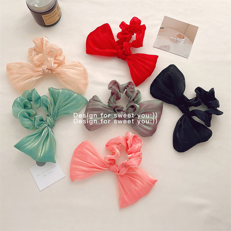 Two sets of sweet  soft  colored mercerized bows with hair bands