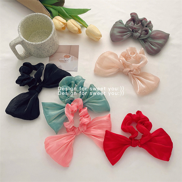 Two sets of sweet  soft  colored mercerized bows with hair bands