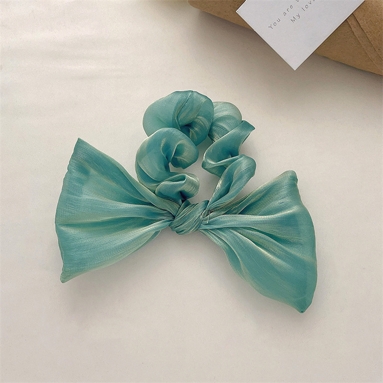 Two sets of sweet  soft  colored mercerized bows with hair bands