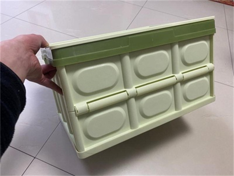 Folding box with plastic cover for storage