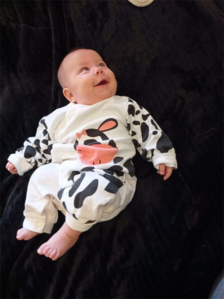 Lenbay Cow printed organic cotton baby jumpsuit with long sleeves